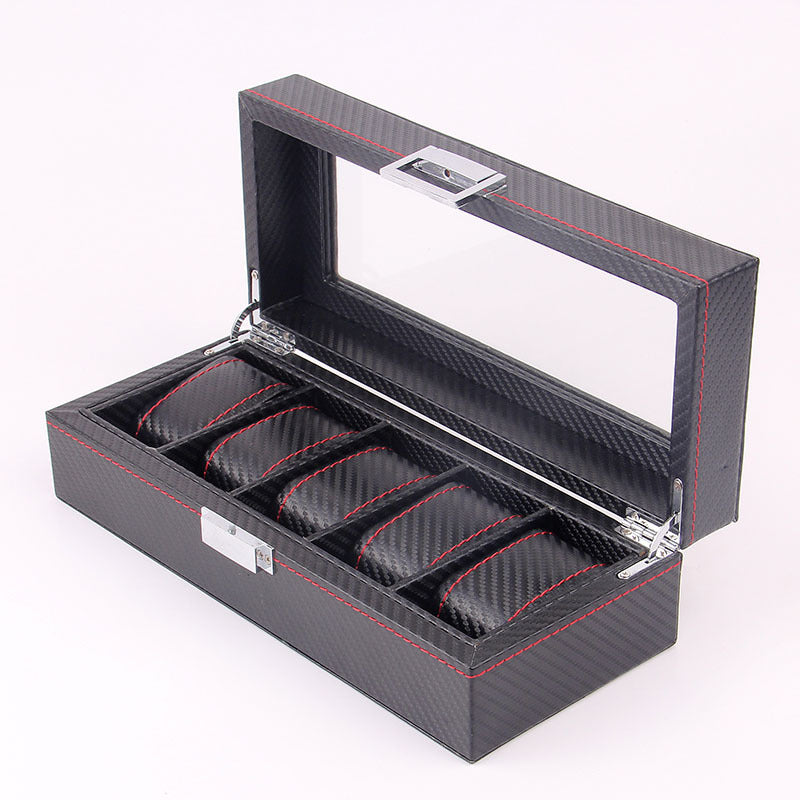 Collector's watch box with carbon-fiber-textured finish and individual padded slots