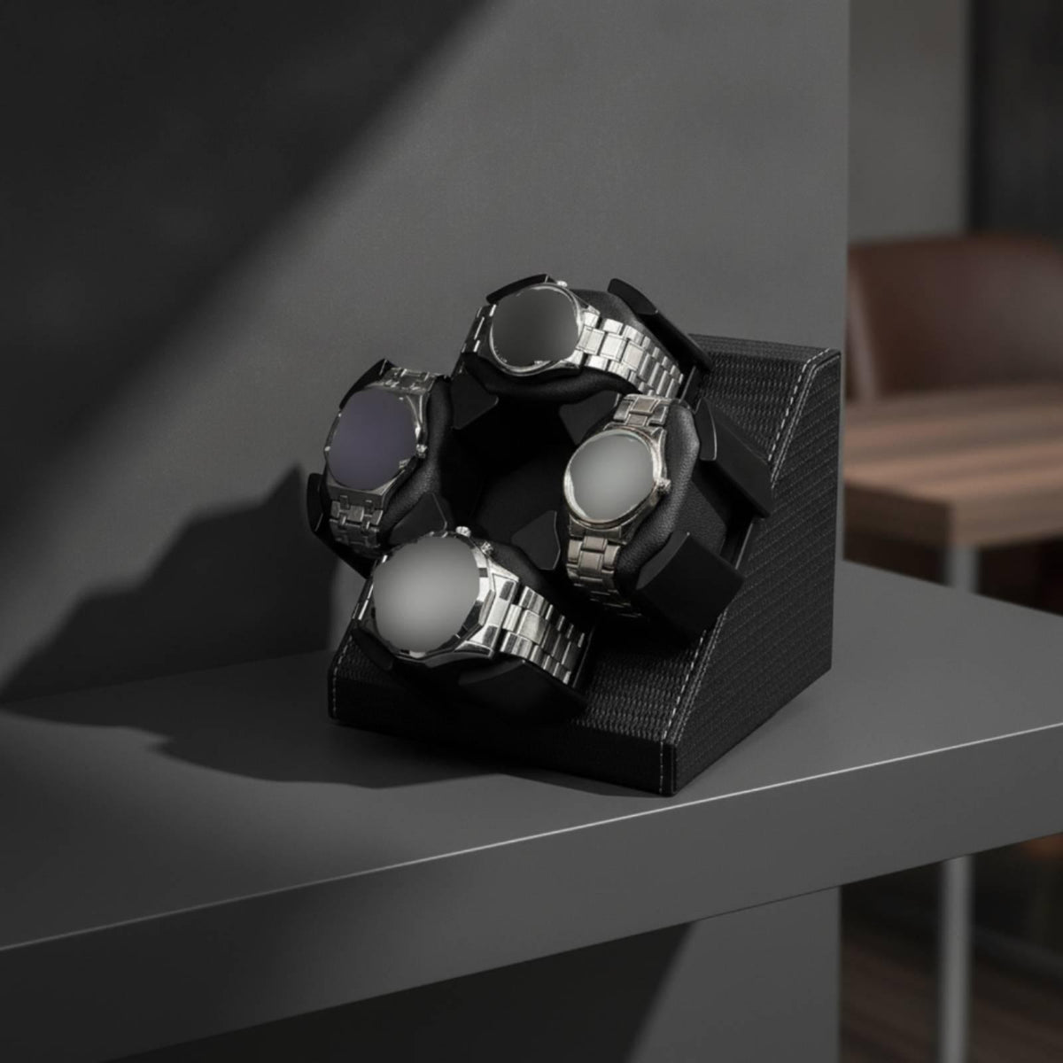 Four-watch automatic winder in black textured finish holding four watches